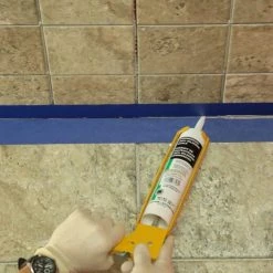 Commercial #165 Delorean Gray 10.1 oz. Silicone Caulk by Custom Building Products -EMSER TILE store custom building products grout caulk ccsc165 1f 1000